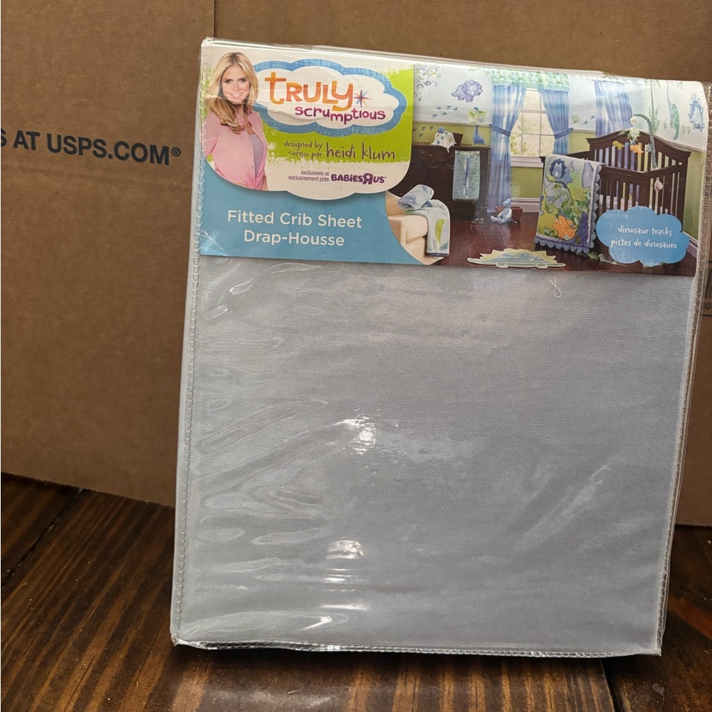 “Truly Scrumptious" fitted crib sheet from the "Dinosaur Tracks"